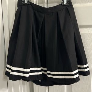 black high waisted pleated skirt with white strips